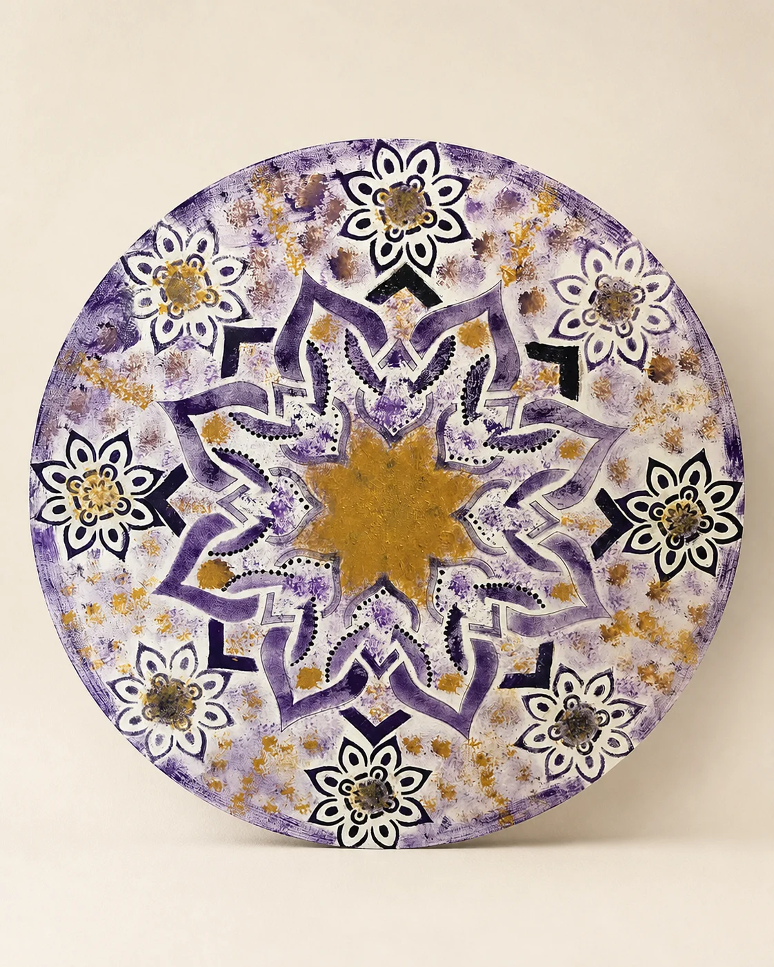 Handmade violet and gold mandala
